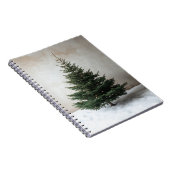 雪の上に柔らかい光を持つミニマルなクリスマスツリー ノートブック (右側)