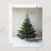 雪の上に柔らかい光を持つミニマルなクリスマスツリー ポストカード (正面/裏面)