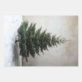 雪の上に柔らかい光を持つミニマルなクリスマスツリー ラッピングペーパーシート (正面)