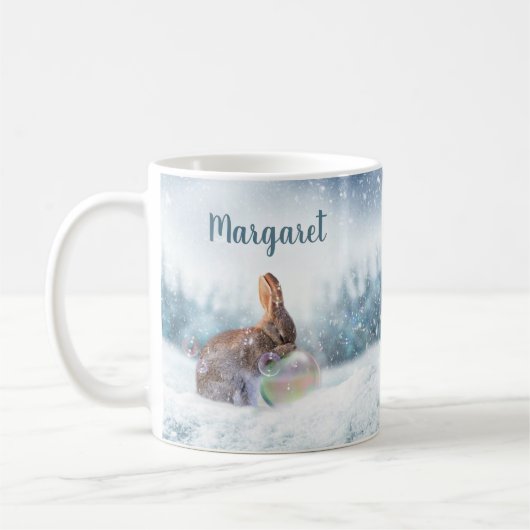 雪の中での祈りのウサギのマグカップ コーヒーマグカップ (左)