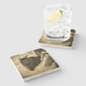 雪の中でぶつぶつ言うエンジェル猫 ストーンコースター (横)