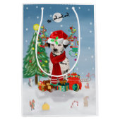 雪の中でクリスマスのプレゼントを贈るダシュント犬 ミディアムペーパーバッグ (正面)