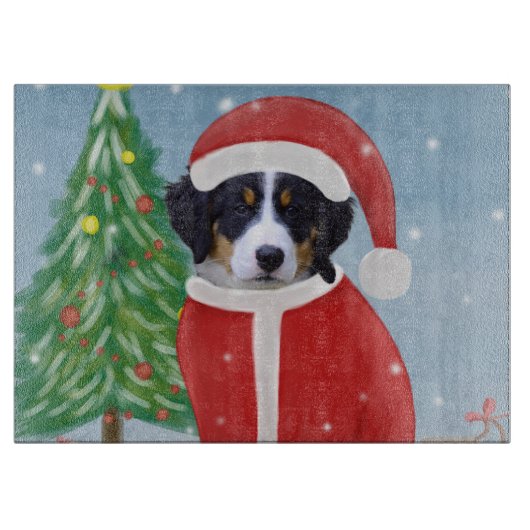 雪の中でクリスマスのプレゼントを贈るベルネーゼ山犬 カッティングボード (正面)