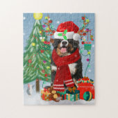 雪の中でクリスマスのプレゼントを贈るベルネーゼ山犬 ジグソーパズル (縦)