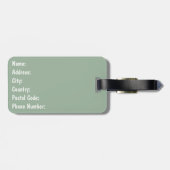 雪の中でクリスマスプレゼントを贈る可愛いペンギン ラゲッジタグ (裏面横)