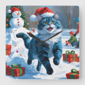 雪の中でクリスマス帽子をかぶったシャム猫 スクエア壁時計 (正面)