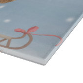 雪の中でコッカースパニエル犬の犬とクリスマスプレゼント カッティングボード (角)