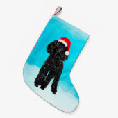 雪の中でサンタ帽をかぶったプードル犬 スモールクリスマスストッキング