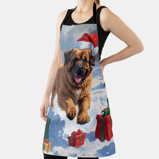 雪の中でチベッ走トのマスチフのクリスマス帽子と エプロン (インサイチュ)