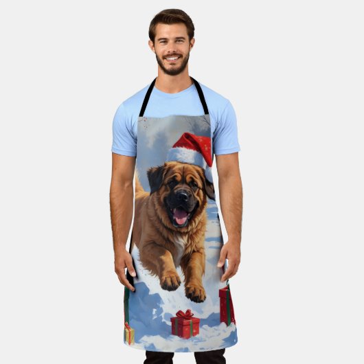 雪の中でチベッ走トのマスチフのクリスマス帽子と エプロン (着用した状態)