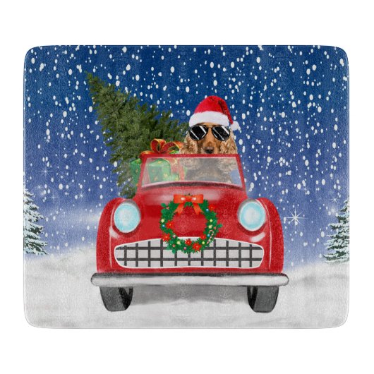雪の中で車を運転するコッカー・スパニエル クリスマス カッティングボード (正面)