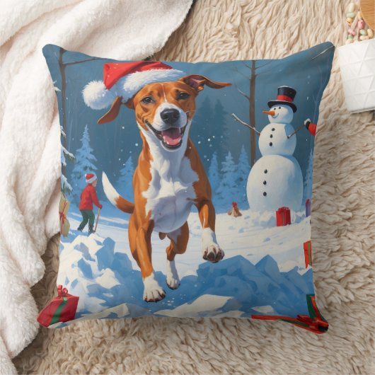 雪の中で遊ぶバセンジー犬の冬の情景 クッション (ブランケット)