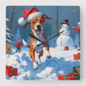 雪の中で遊ぶバセンジー犬 冬の情景 スクエア壁時計 (正面)