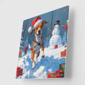 雪の中で遊ぶバセンジー犬 冬の情景 スクエア壁時計 (傾斜)