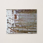 雪の中で鹿、脚をなめる ジグソーパズル (横)