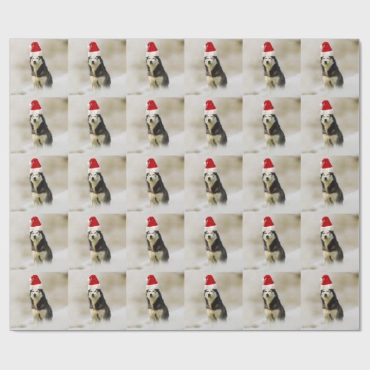 雪の中にサンタハットを持つシベリアのハスキー犬 ラッピングペーパー (フラット)