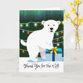 雪の中にホッキョクグマを持ったクリスマスプレゼントをありがとう カード (黄色い花)