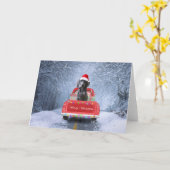 雪の中に座るクリスマストラックのワイマラナー犬 カード (黄色い花)