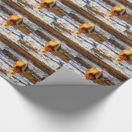 雪の中に茶色とクリームのミニチュアホース。 ラッピングペーパー (角)