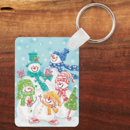 雪の中のかわいいクリスマス雪だるまファミリー キーホルダー (裏面)