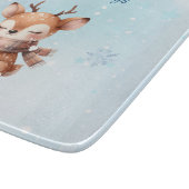 雪の中のかわいい鹿 カッティングボード (角)