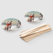 雪の中のアメリカの（犬）スタッフォード犬 ハンドファン