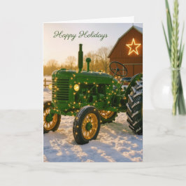 雪の中のクリスマスの緑の農場のトラクター カード