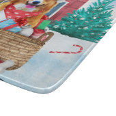 雪の中のコルギドッグクリスマスドッグハウス カッティングボード (角)