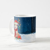 雪の中のコルギ犬とクリスマスプレゼント コーヒーマグカップ (正面左)