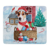 雪の中のジャック・ラッセル犬のクリスマスドッグハウス カッティングボード (正面)