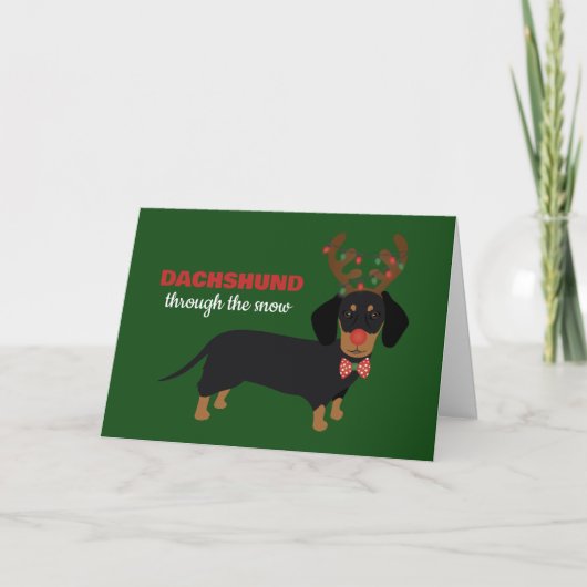 雪の中のダックスフンド 可愛いドキシーのトナカイ犬 シーズンカード (正面)