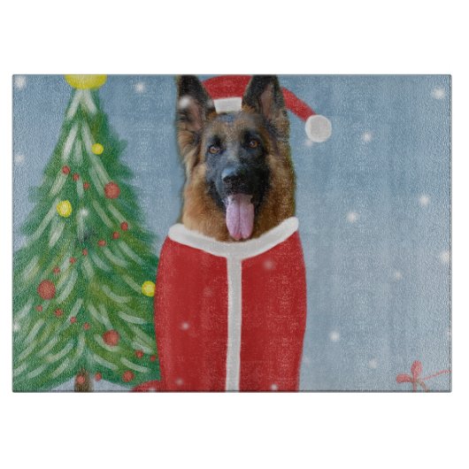 雪の中のドイツの羊飼い犬とクリスマスプレゼント カッティングボード (正面)