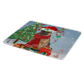 雪の中のドイツの羊飼い犬とクリスマスプレゼント カッティングボード (角)