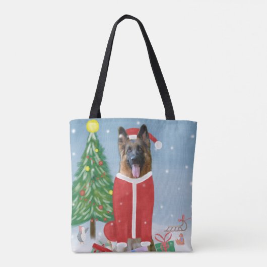 雪の中のドイツの羊飼い犬とクリスマスプレゼント トートバッグ (裏面)