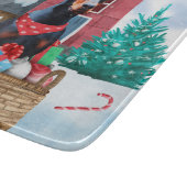 雪の中のドバーマンドッグのクリスマスドッグハウス カッティングボード (角)