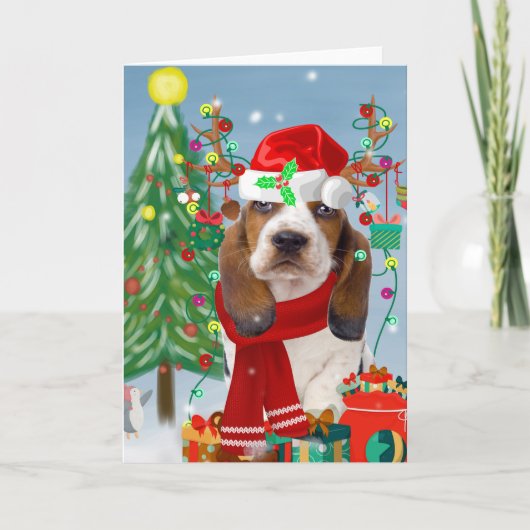 雪の中のバセットハウンド犬とクリスマスプレゼント カード (正面)