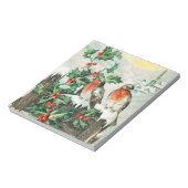 雪の中のフェンスの上に2つのロビン ノートパッド (回転)