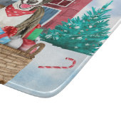 雪の中のブルテリア犬クリスマスドッグハウス カッティングボード (角)