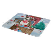 雪の中のブルテリア犬クリスマスドッグハウス カッティングボード (角)