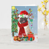 雪の中のプレゼントを抱えたパグ犬 カード (黄色い花)