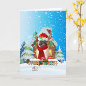 雪の中のプレゼントを抱えたパグ カード (黄色い花)