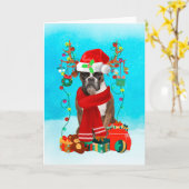 雪の中のプレゼントを抱えたボクサー カード (黄色い花)