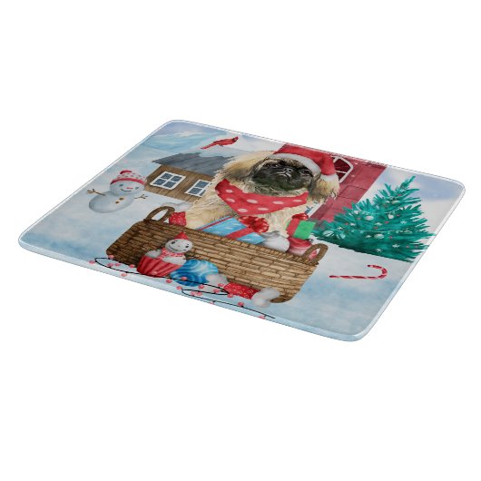雪の中のペキンゼドッグのクリスマスドッグハウス カッティングボード (角)