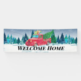 雪の中のホームカムレッドトラックのクリスマスツリー 横断幕