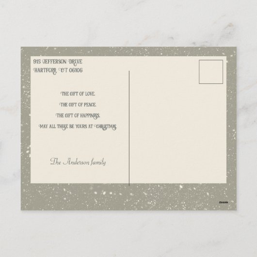 雪の中のヴィンテージの女性とクリスマスの挨拶 シーズンポストカード (裏面)