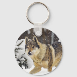 雪の中の大きな美しい灰色の野生の狼 キーホルダー