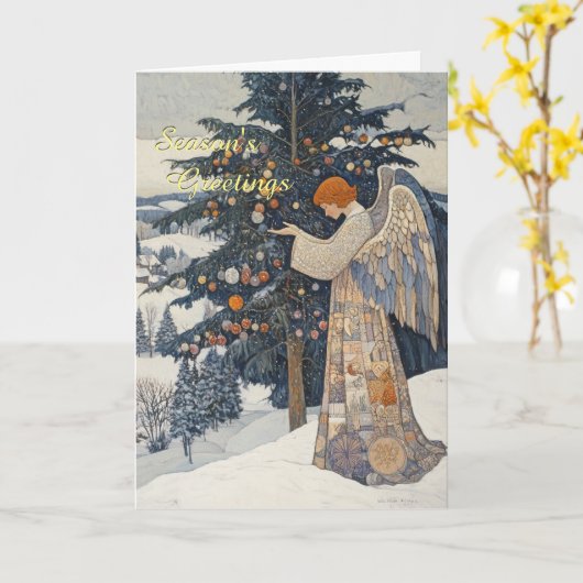 雪の中の天使のクリスマス カード (黄色い花)