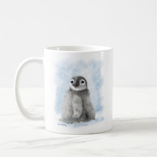 雪の中の愛らしいペンギンの雛のキャラクター コーヒーマグカップ (左)