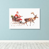雪の中の水色のサンタクロース キャンバスプリント (インサイチュ (ウッドフロア))