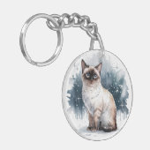 雪の中の猫4丸いアクリルキーチェーン キーホルダー (正面左)